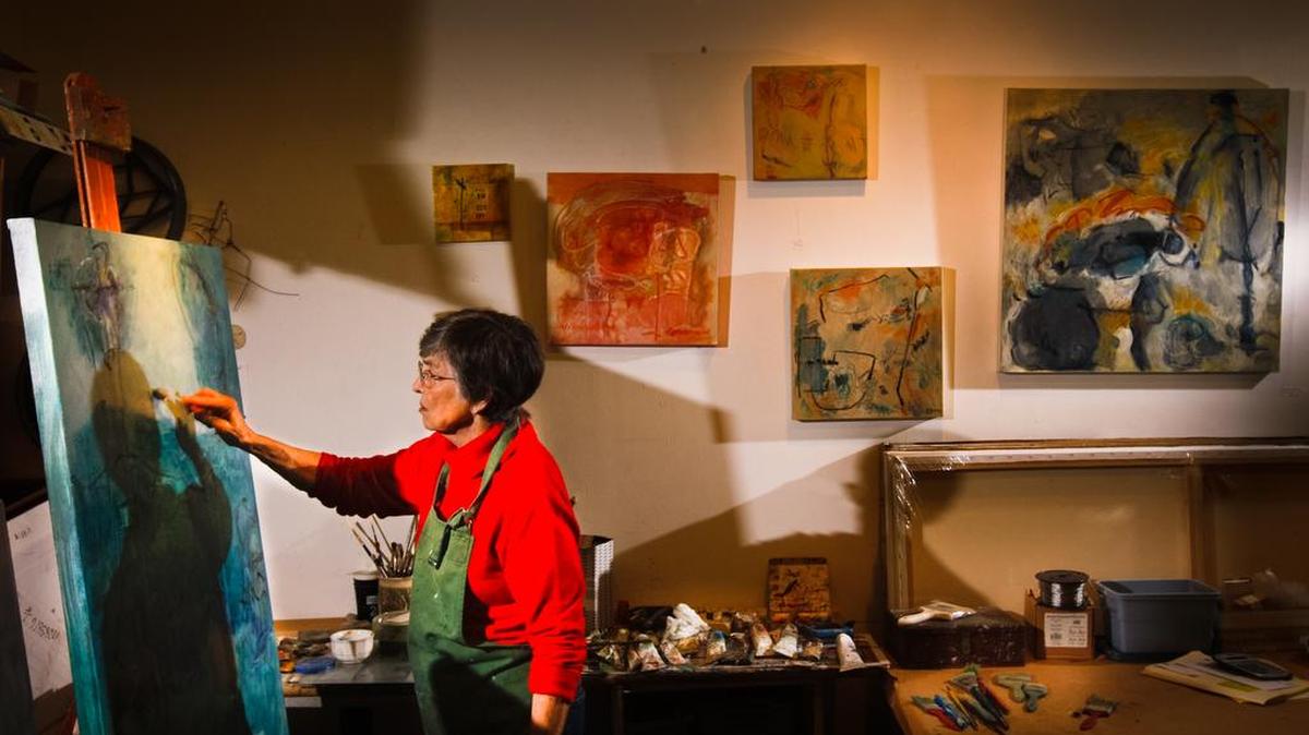 Vista Studios artist Laura Spong paints in her studio in 2011.