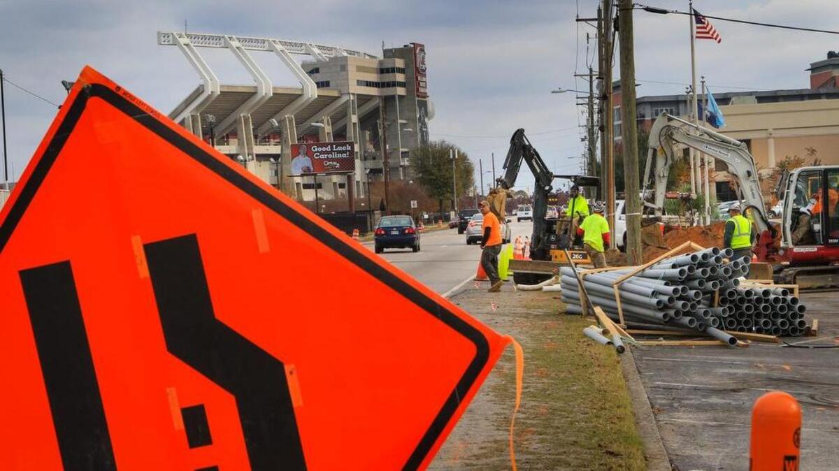 Construction crews are working on widening Bluff Road at the S.C. State Fairgrounds and burying the power lines underground. The power lines could be buried along Bluff Road all the way from Williams-Brice Stadium to Interstate 77, but it would cost millions that could go toward other road projects. Richland County Council has to decide if it’s worth the cost.