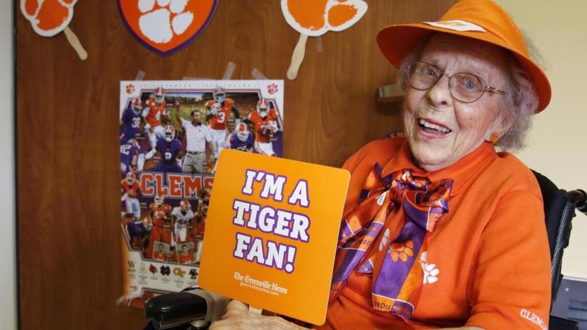 Phoebe McCallum, a 97-year-old Clemson superfan at Park Pointe Village in Rock Hill, has been cheering for the Tigers for decades.