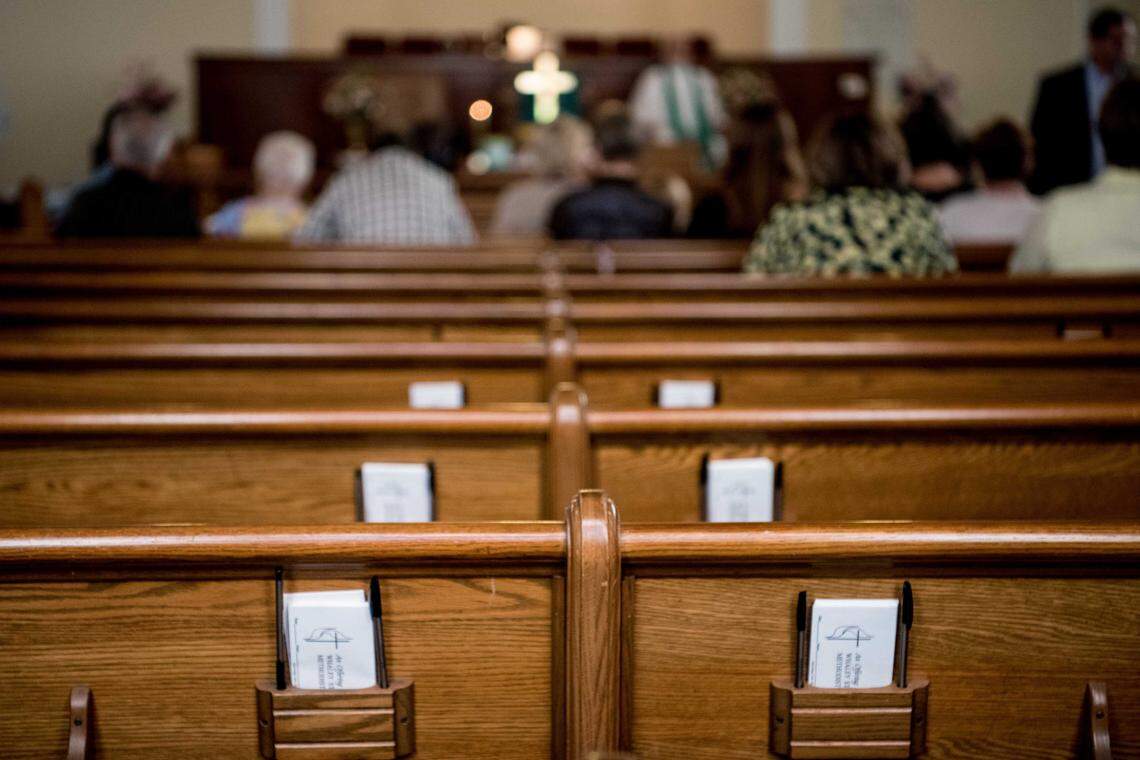 Parishioners participate in Sunday service at Whaley Street United Methodist Church on August 5, 2018, in Columbia, S.C. Attendance at the church is a fraction of the size it once was when the Olympia and Granby mills operated and mill families packed the house of worship.