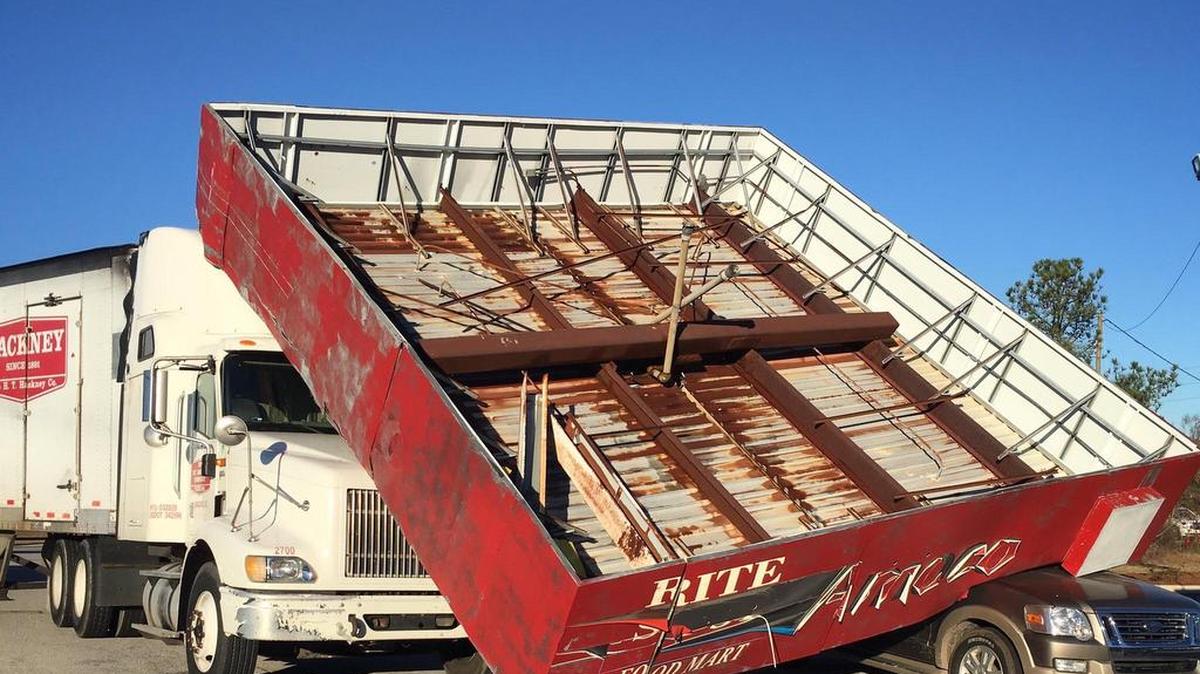 A truck crashed into the awning of a Lexington gas station Wednesday morning, knocking the structure over.