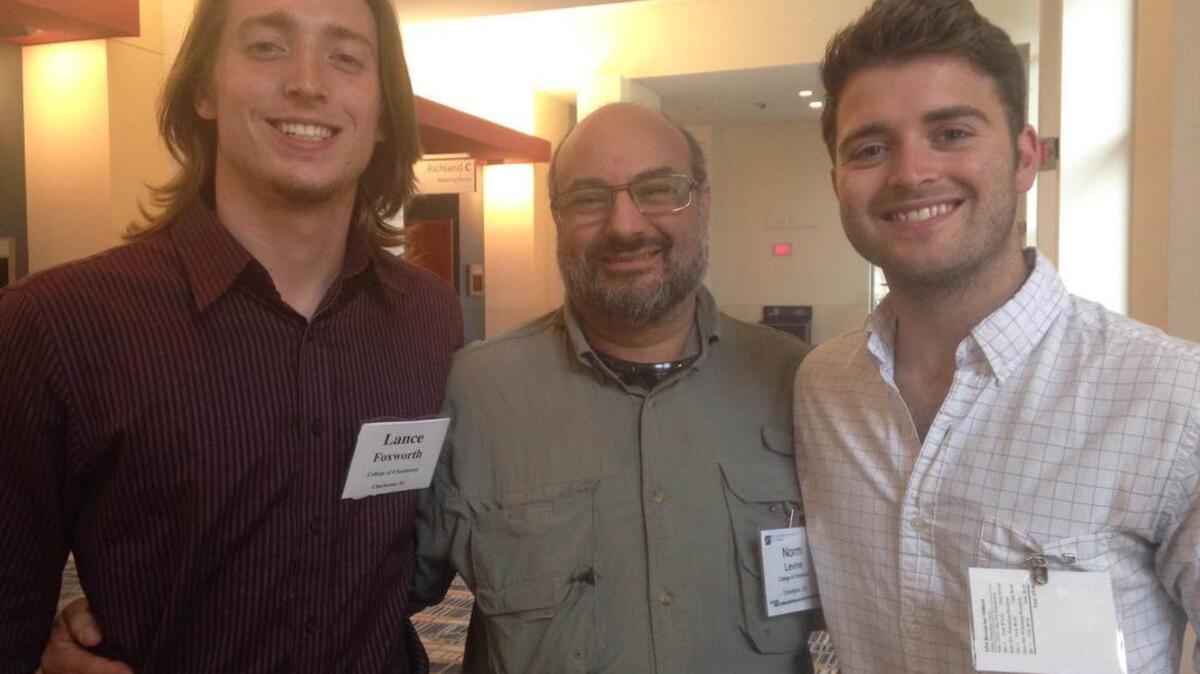 College of Charleston students Lance Foxworth, left, and Dante Curcio, right, worked on an online program and walking tour that would educate South Carolinians on earthquakes and hazard preparedness. College of Charleston geology professor Norman Levine, center, oversaw their work last summer.