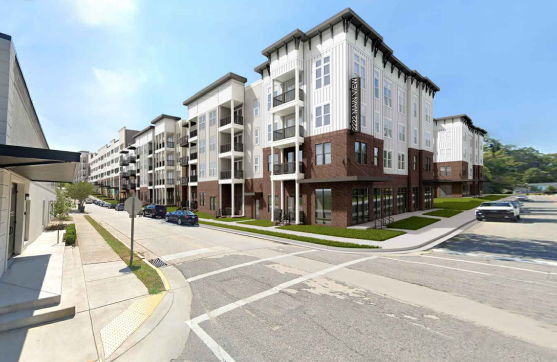 Plans for a new luxury apartment complex at the former Jim Moore Cadillac dealership are back on the table, after being stalled since 2021.