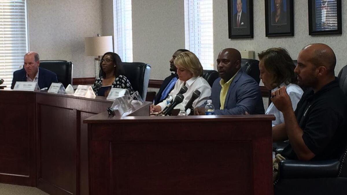A new slate of Richland County Recreation commissioners met for the first time Monday. Only Thomas Clark, third from right, remains from the old commission that was racked with allegations of public corruption.
