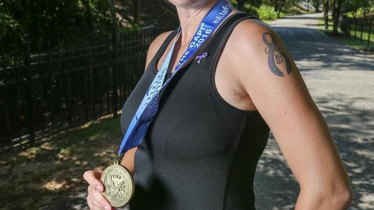 Elizabeth Gray, of West Columbia, is running a marathon in every state for domestic violence awareness. She, herself, is a survivor of domestic violence.
