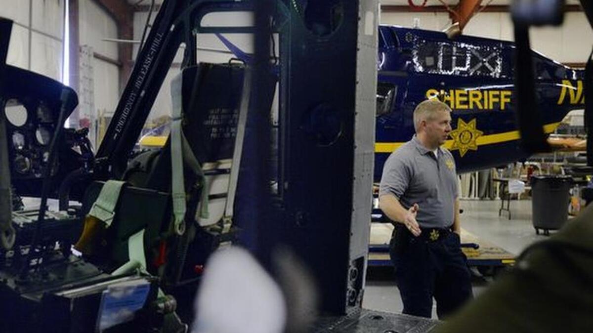 Sergeant Chris Hines, one of two helicopter pilots for the Greenville County Sheriff's Office, talks about the technology inside the helicopter that makes it easier to find people from the air on Nov. 5, 2015.