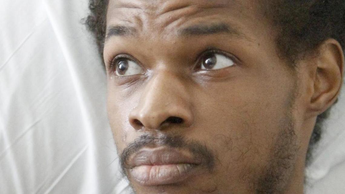 Julian Betton, who was shot by police during an April 16 drug raid, has filed a federal lawsuit against the officers who shot him.