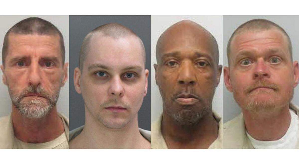 (From the left) John Tely King, Jason Howard Kelley, Jimmy Ham and William Bradley Scruggs were found dead inside a dorm at Kirland Correctional Institution.