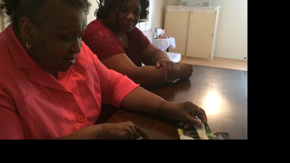 
Annie Williams sits at a table looking through photographs of of her son, Rodney Williams, along with her daughter, Jennifer Kitt (right). Rodney Williams was killed in a hit-and-run accident in five years ago, and his family members are still searching for answers as to who is responsible for his death.
