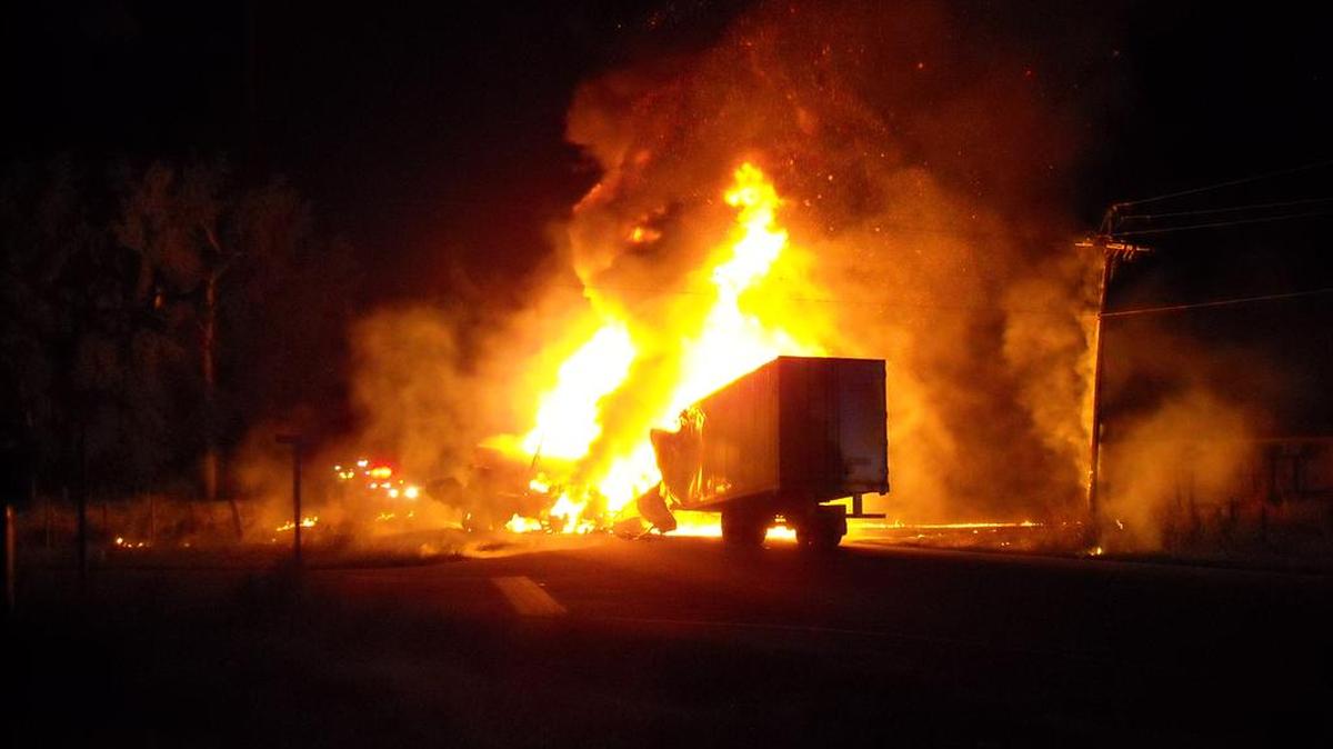 A fireball erupted just after an 18-wheeler traveling at night eight miles west of Orangeburg struck an unlit gasoline tanker that was blocking the road.