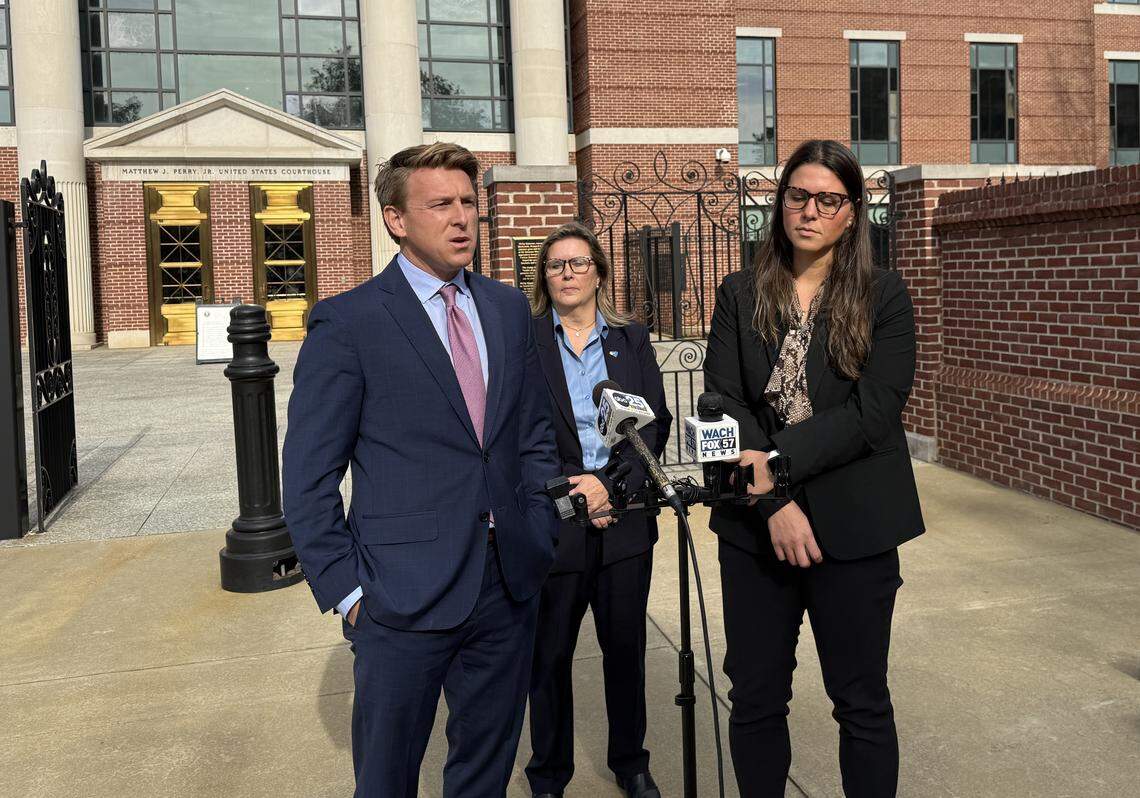 Federal prosecutors Elliott Daniels (left) and Elle Klein (right) talk with reporters following Thursday’s sentencing of Stephen Todd Green, who previously pleaded guilty to crimes including producing child sexual abuse material. Lead FBI special agent Jackie Hamelryck is center.