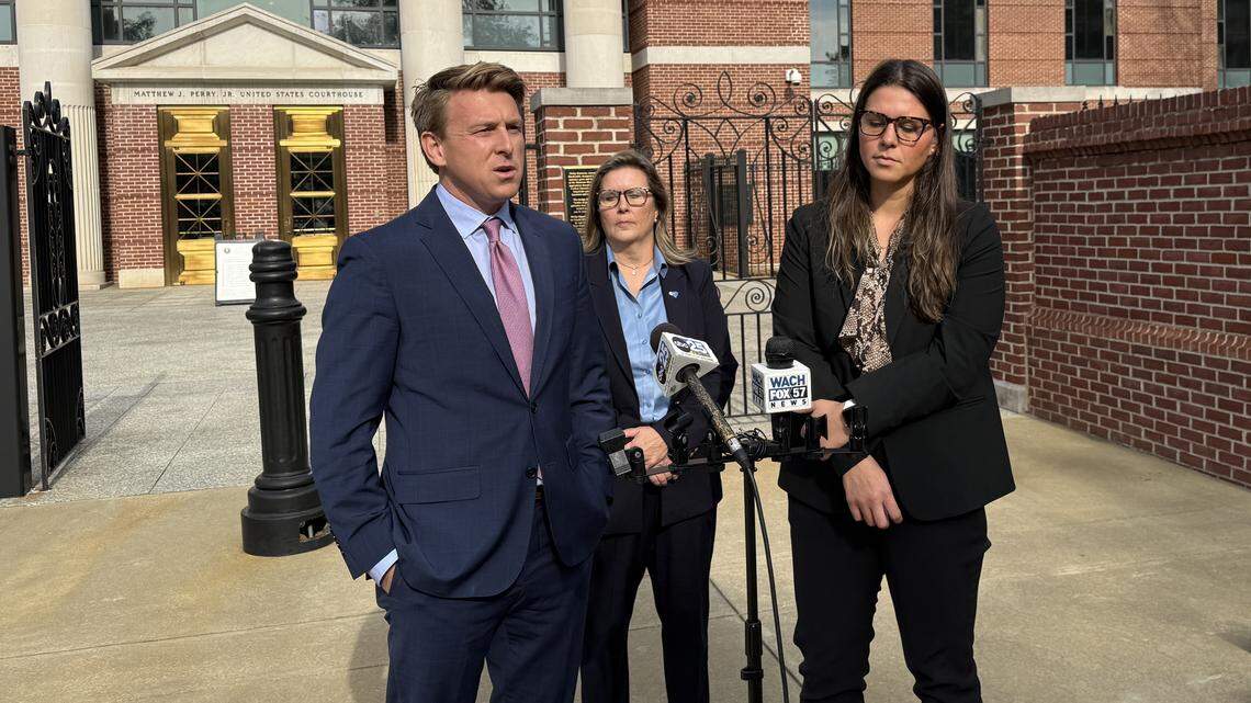 Federal prosecutors Elliott Daniels (left) and Elle Klein (right) talk with reporters following Thursday’s sentencing of Stephen Todd Green, who previously pleaded guilty to crimes including producing child sexual abuse material. Lead FBI special agent Jackie Hamelryck is center.