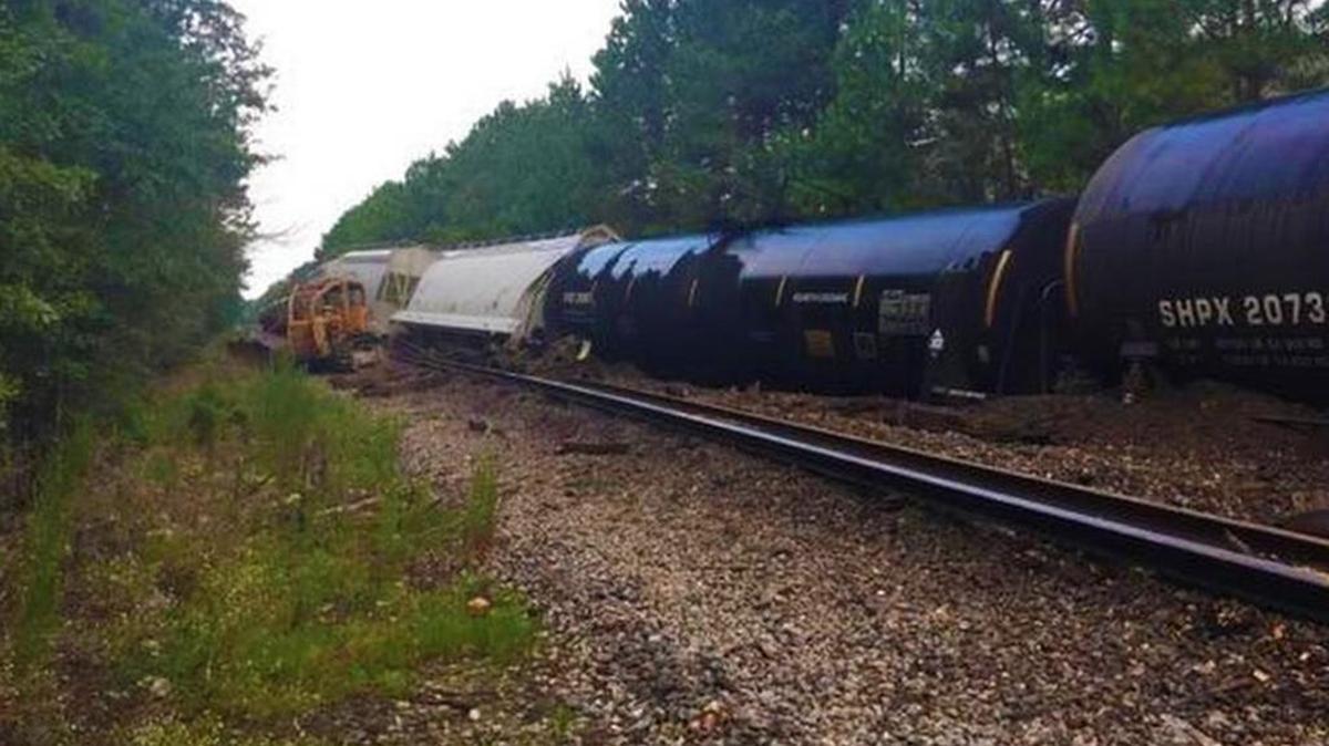 12 of 18 cars on the train as well as one of the two locomotives ran off the tracks.
