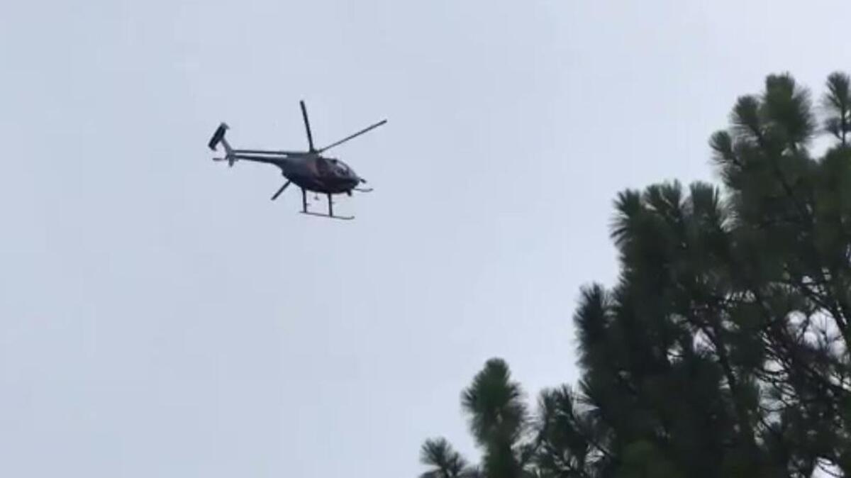A State Law Enforcement Division helicopter was deployed following reports that a murder suspect was spotted in Chapin, South Carolina.