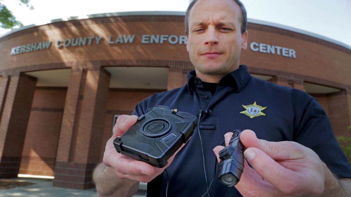 
Lt. Danny Templar describes the Taser Axon Flex Body police camera. Kershaw County sheriff's deputies will soon be using the cameras. 
