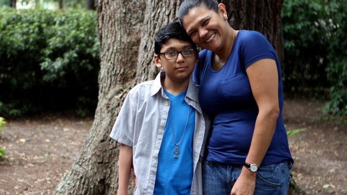 
Yenny Ponce, of Bluffton, smiles with her son Christopher Ponce, 9, in Bluffton on Sunday afternoon. Yenny and her son were reunited on Friday in Atlanta, six months after he was reportedly abducted to Mexico by his stepfather, William Stanley King. 
