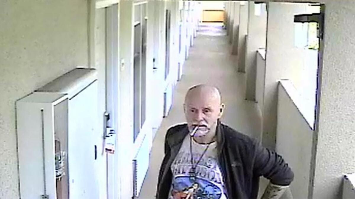 Surveillance cameras caught who police believe is Terry Thomas after allegedly robbing a victim at a Super 8 motel in May.