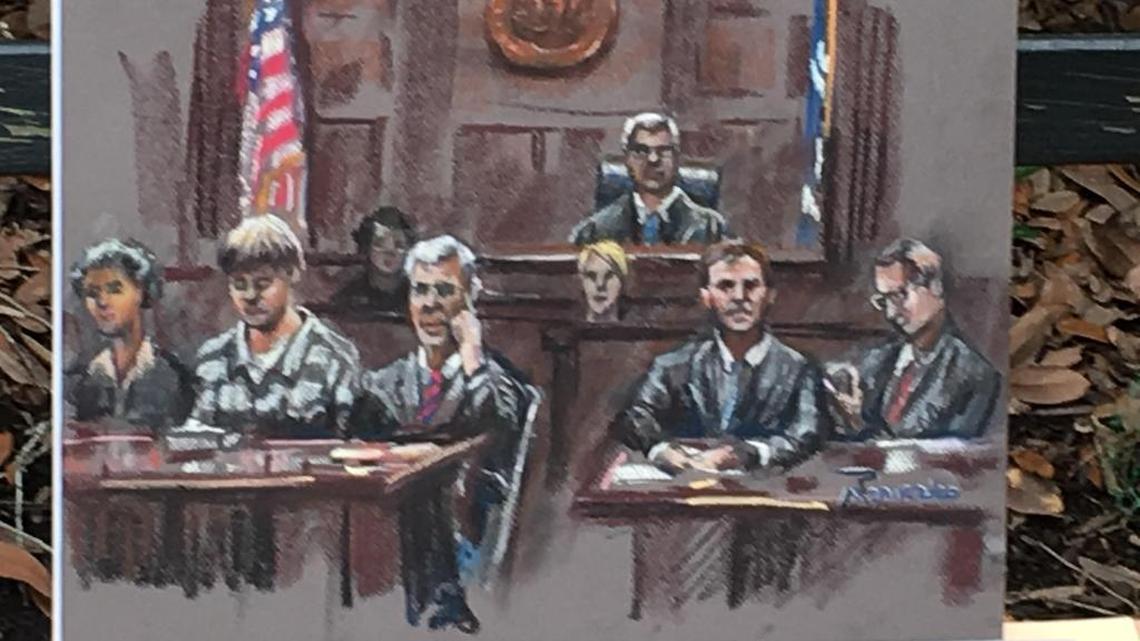 Opening day of Dylann Roof jury selection in federal court in Charleston. Roof sits at the defense table on left side of drawing, under the American flag. Federal prosecutors are on the right. Judge Richard Gergel is in the middle.