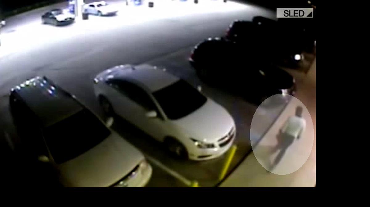 
Surveillance video at Monks Corner Kangaroo Express. Suspect in long sleeved white shirt (highlighted)
