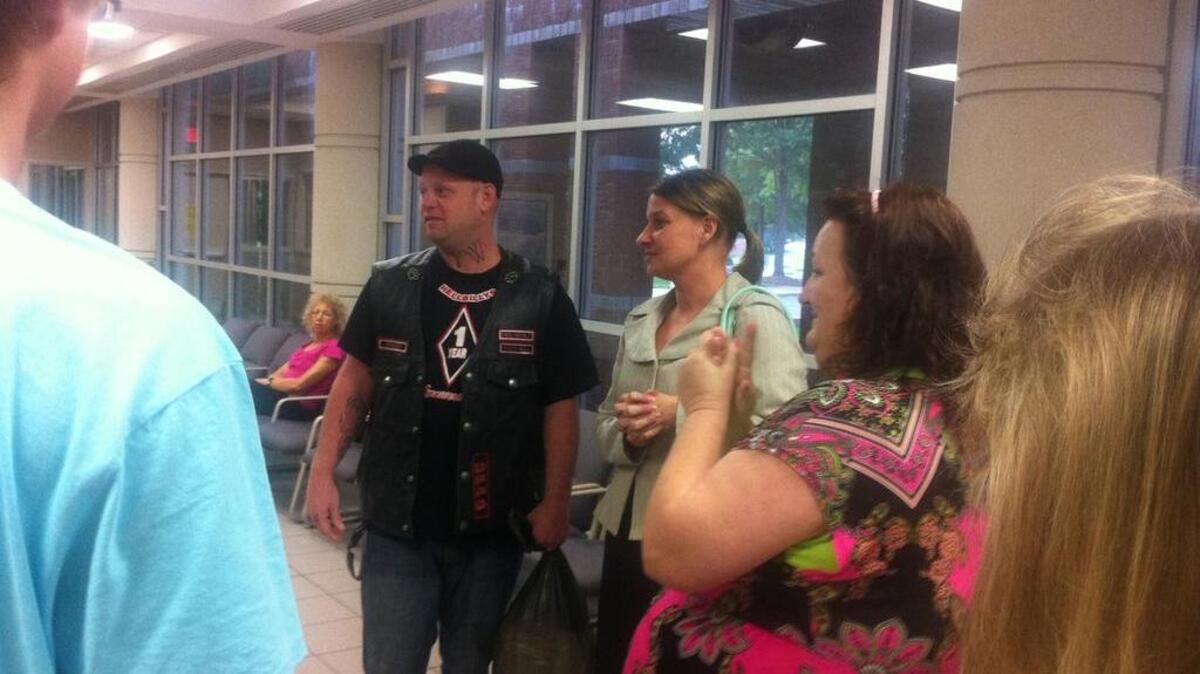 
Jason Thatcher with family and friends after being released from jail in 2013. Police dropped the charges, saying he didn’t rob the Rock Hill CVS. 
