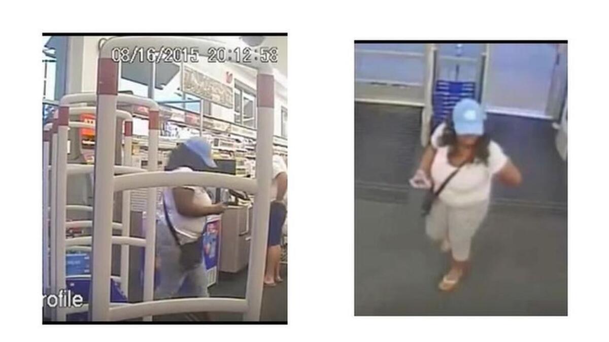 
Surveillance photos of woman who used credit card information fraudulently on August 16, 2015. 
