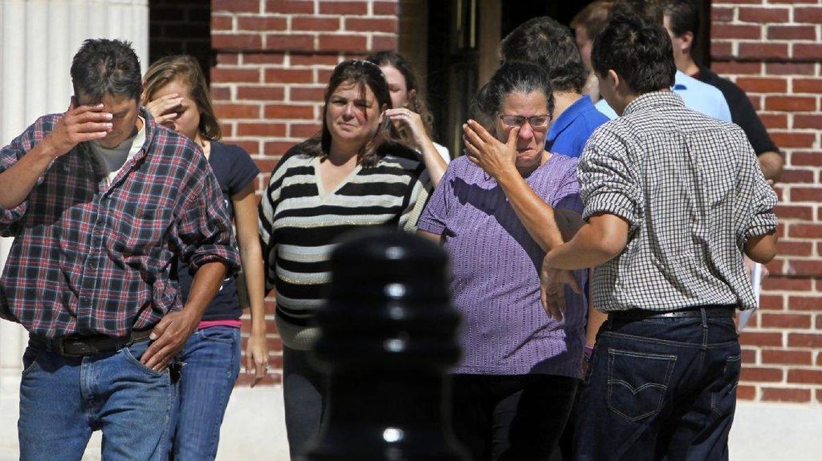 
Kimberly Konzny, mother of Joey Meek, sheds a tear after walking out of the Federal Courthouse, Friday, Sept. 18, 2015. Meek was arraigned in federal court in Columbia Friday morning on charges misprision of a felony and making a false statement.
