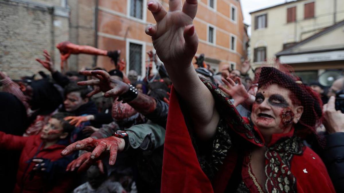 Zombies rally the streets during the Venice Carnival, in Venice, Italy, Saturday, Feb.11, 2017. The Venice carnival in the historical lagoon city attracts people from around the world.