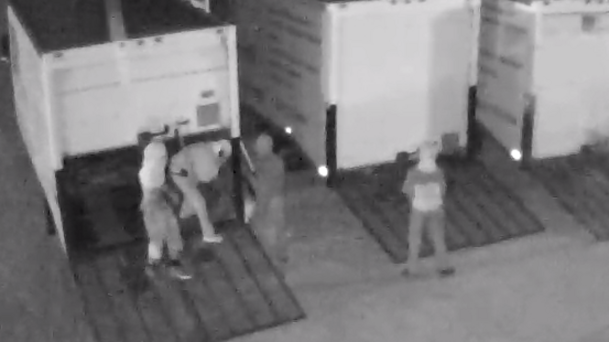Surveillance footage of robbery at Green Earth Services.