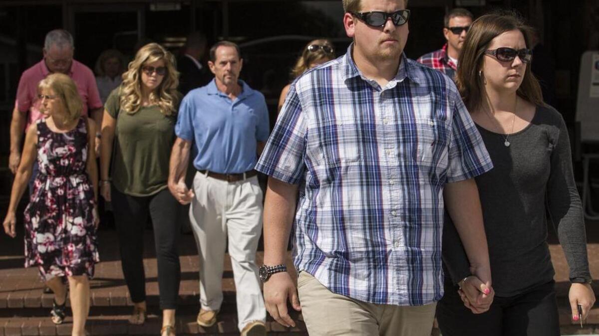 Family and friends of two women killed in a Conway bank robbery leave the John L. McMillan Federal Building in Florence. Brandon Michael Council, 32, of Wilson, N.C., was arraigned on federal charges Thursday for a Conway bank robbery last month that left two women dead.