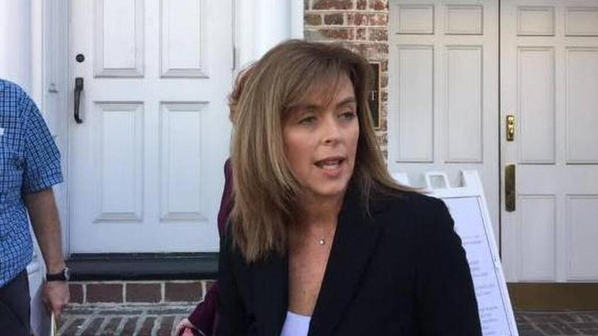 Meek’s attorney, Debbie Barbier, speaks to reporters before leaving the courthouse Tuesday.