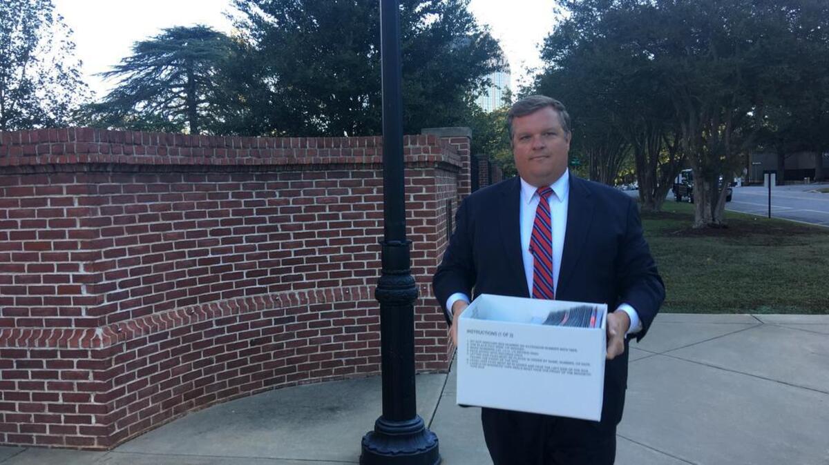 Assistant U.S. Attorney Jim May on way to court Tuesday for Irish Travelers case