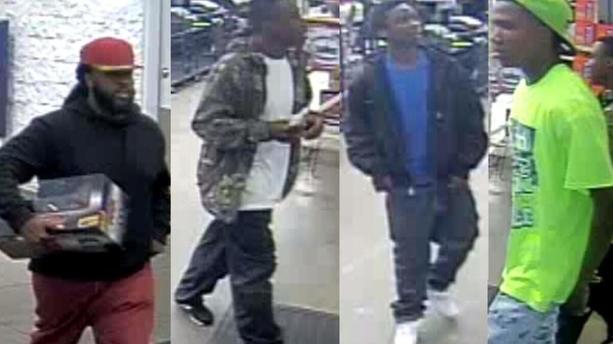 Surveillance photos of 4 men wanted for allegedly passing counterfeit money to buy gift cards
