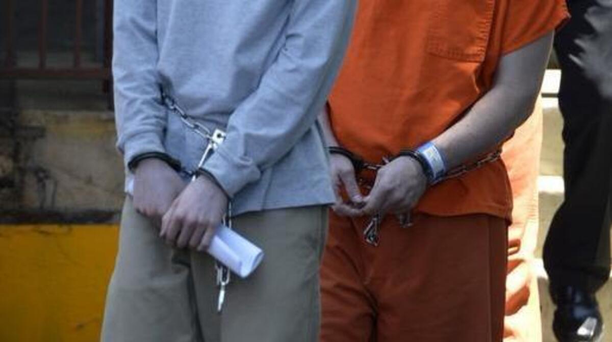 JUNE 2015 FILE PHOTO: Justin Nojan Sullivan, 19, exits the Federal courthouse in Charlotte shortly after his arrest.