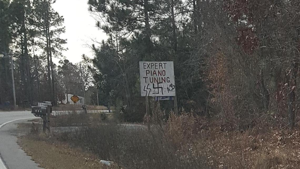 Graffiti of a Swastika on the back of a road sign in Lexington County.
