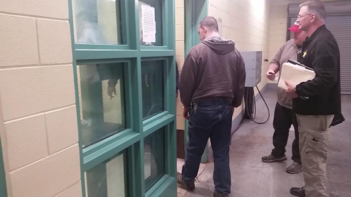 James Lee Ginther doing the perp walk at Sumter-Lee Regional Detention Center Tuesday.