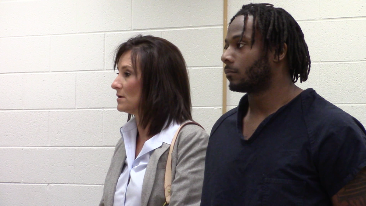Jalen Dread, right, appears with his attorney, Lori Murray, during a bond hearing May 9. Dread is accused of punching a man in the head during an argument in a Five Points bar in April.