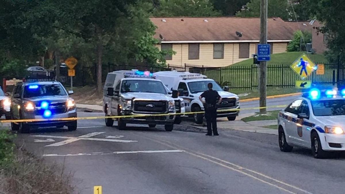 Police rope off area of shooting on Friday at 100 Latimer Manor.