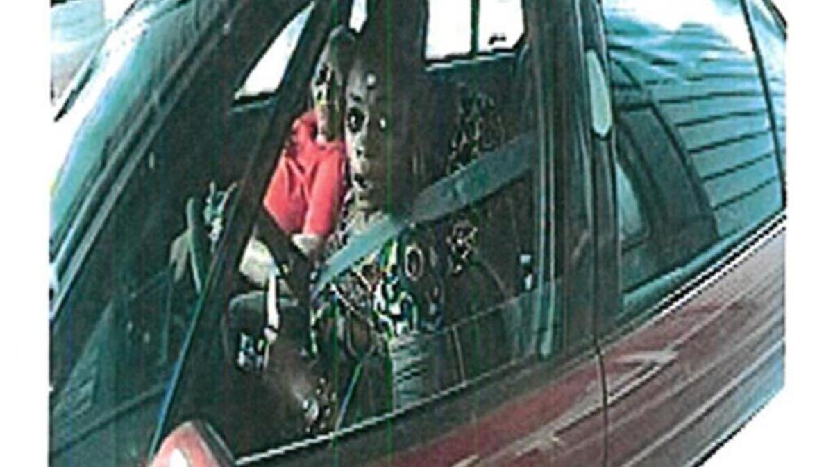 Screen shot- surveillance video at SC State Credit Union on Farrow Road of suspects in Richland County fraud case