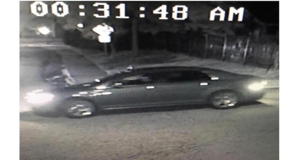 Vehicle photographed leaving apartment complex around time of early morning shooting, August 5, 2016.