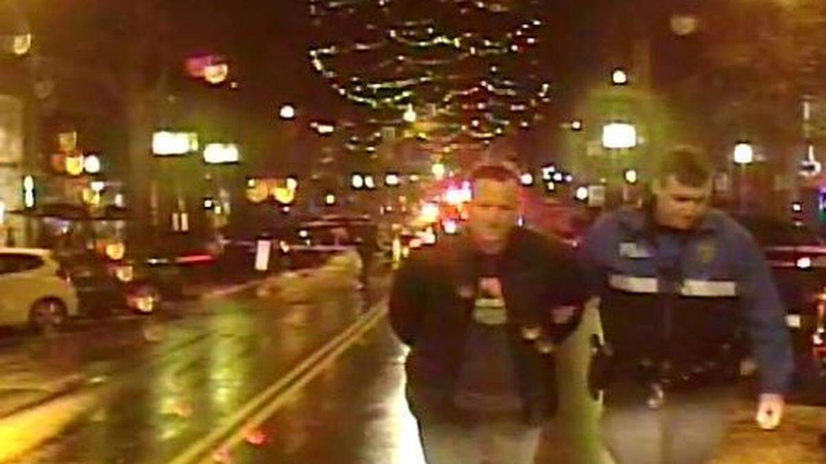 David Robert Lee is seen in a Greenville Police Department dashcam video taking a field sobriety test then being taken away from the scene in handcuffs March 8.