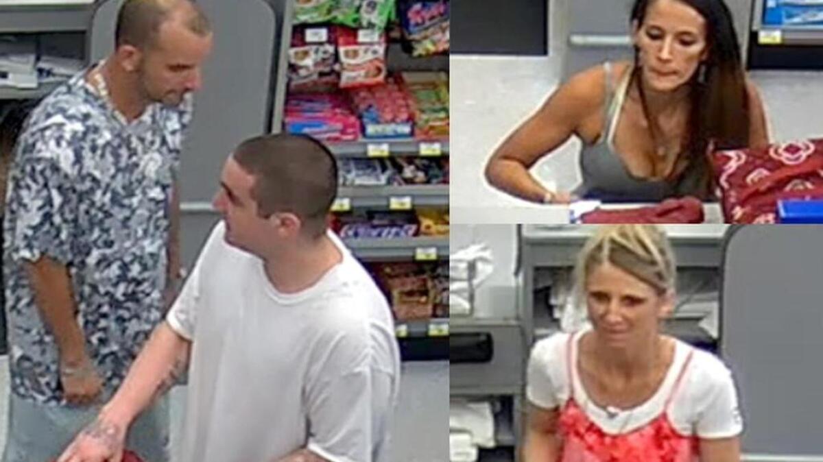 Surveillance photos of four people wanted for credit card fraud by Lexington County