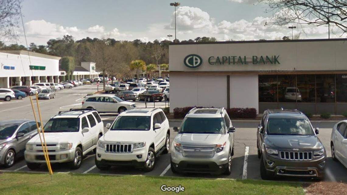 Two armed suspects robbed the Capital Bank on Forest Drive on Friday morning, according to police.