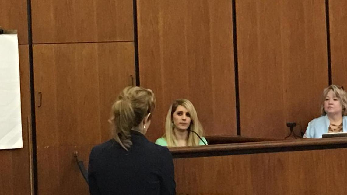 Emily Burn, an employee of the company that offers ankle monitors, testifies Thursday at the Richland County courthouse.