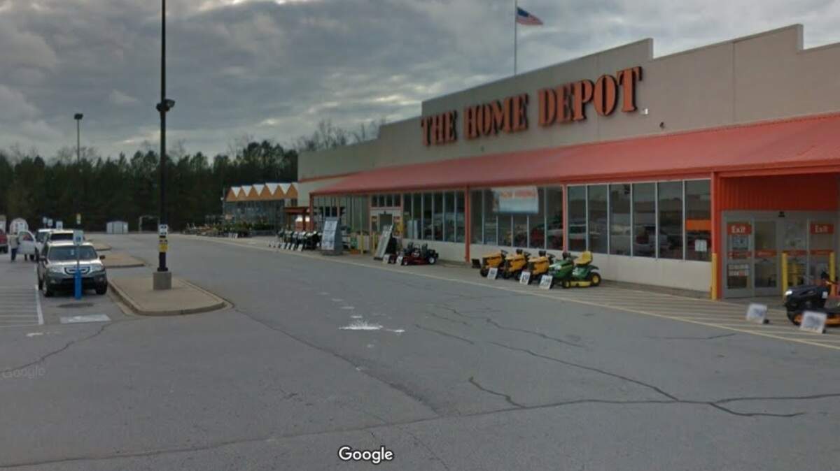 A woman died after being knocked to the ground by a slow-moving car in the parking lot of The Home Depot in Seneca, SC, according to troopers and the coroner.