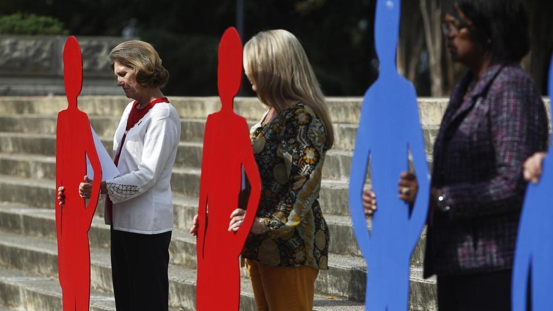 More than 100 people gathered to take part in the 18th annual Silent Witness event remembering victims of domestic violence at the South Carolina State House in 2015.