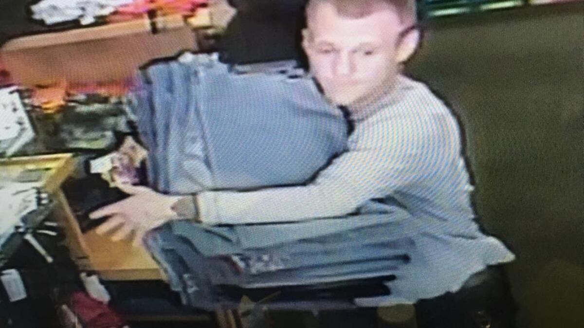 Screenshots provided by the Richland County Sheriff’s Department of the alleged jeans theft at Esquire in the Dentsville area.