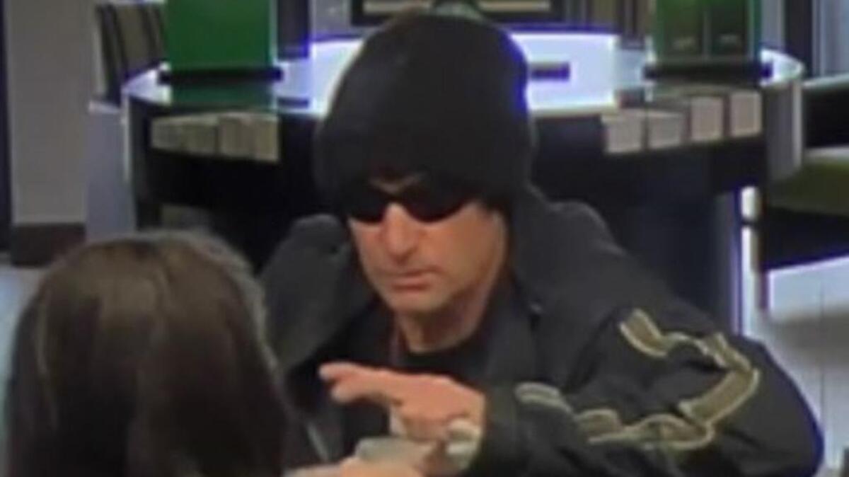 Surveillance videos captured this image of a suspected bank robber at TD Bank Saturday morning.
