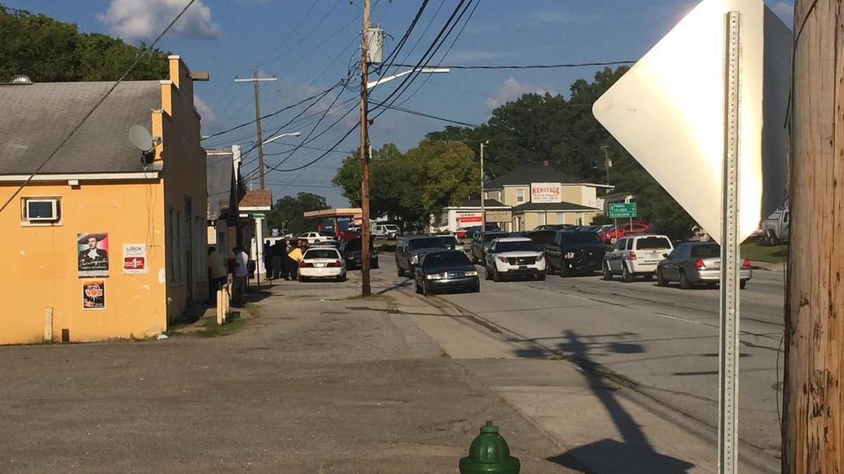 
Scene outside the Leslie Hair Salon Wednesday in Newberry after the body of one of the business’s proprietors was found inside. (August 26, 2015)
