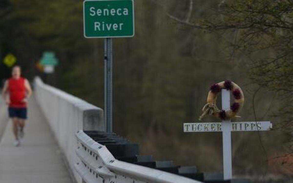 
A cross marks the spot above the Seneca River where Tucker Hipps died near Clemson University on Sept. 22, 2014.
