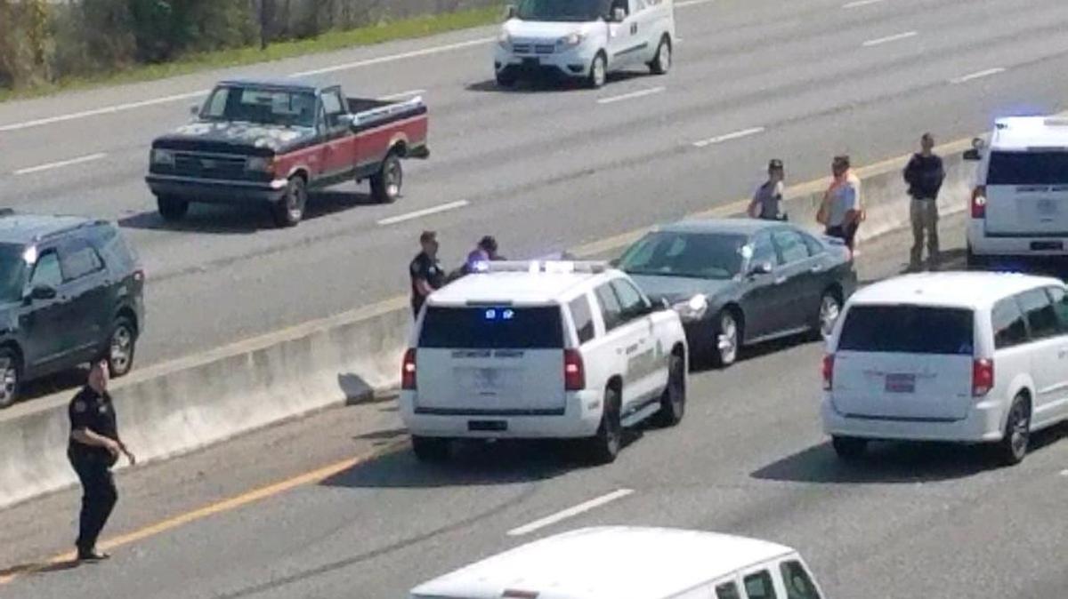 Two suspects in a Chapin bank robbery Monday crash on I-26 near Harbison Boulevard.